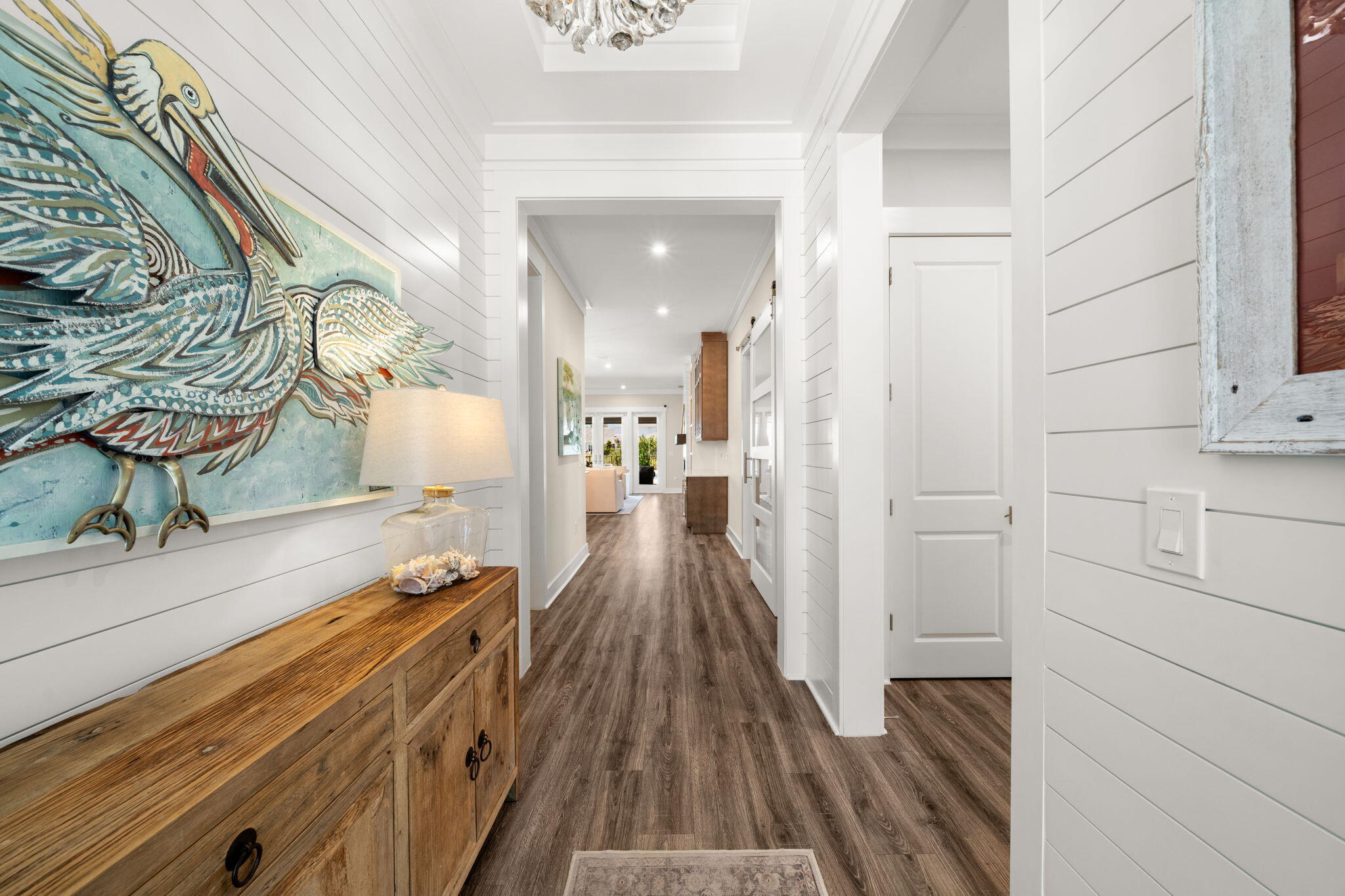 40 Tamoka Ct Inlet Beach Inlet Beach, FL 32461 - Photo 8 of 93 a view of a hallway with wooden floor and staircase