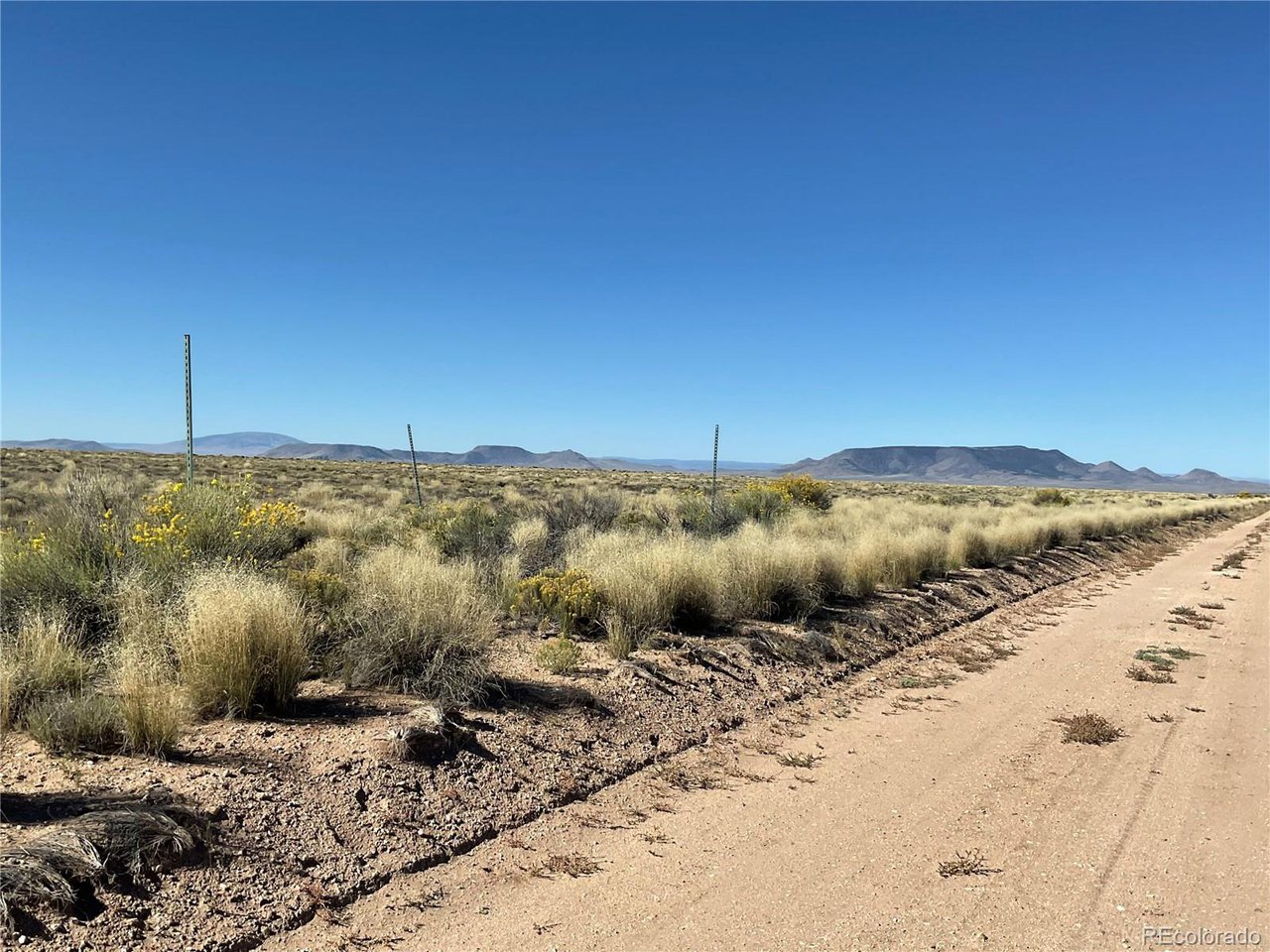 5 Jane Road Sanford, CO 81151 - Photo 3 of 12 a view of a road with an ocean view