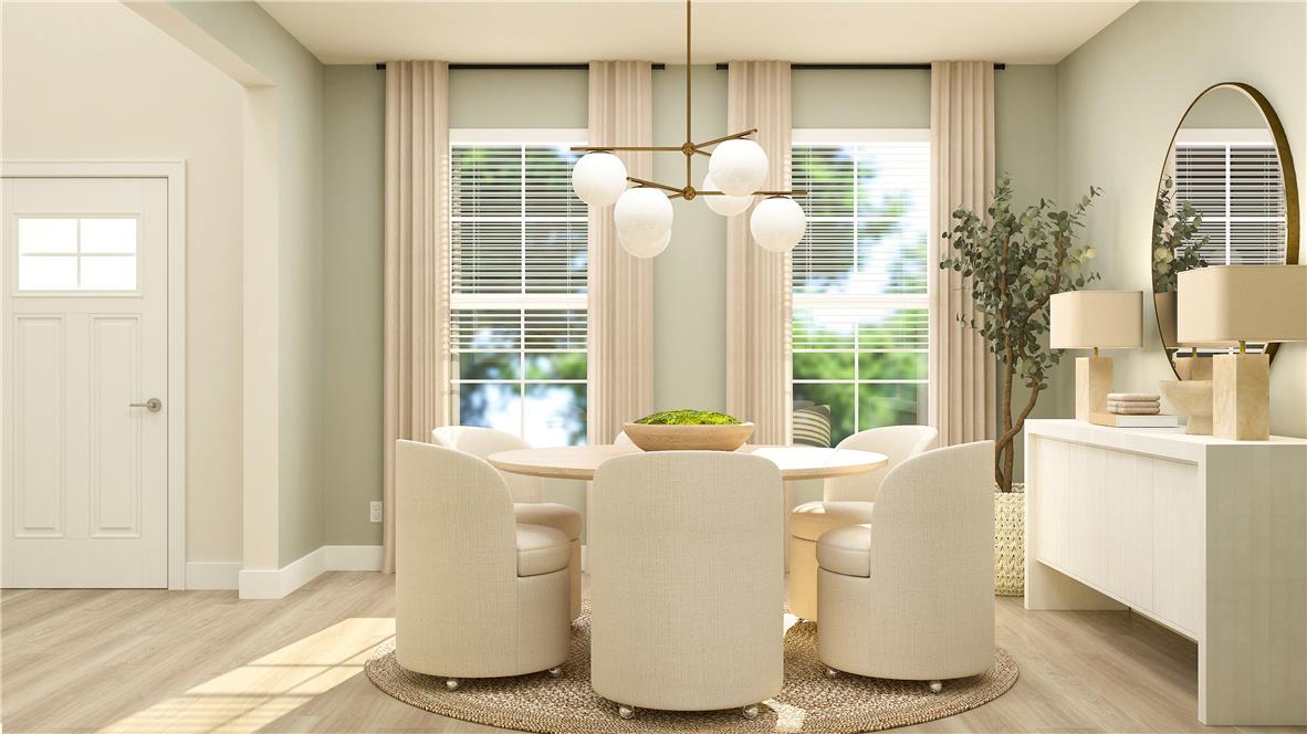 8445 Haaf Road Fogelsville, PA 18051 - Photo 4 of 28 A refined dining space features a warm, inviting ambiance with soft natural light.
