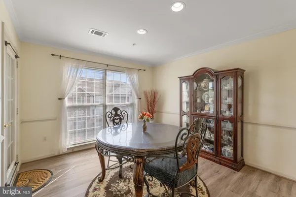 a large kitchen with stainless steel appliances lots of counter top space