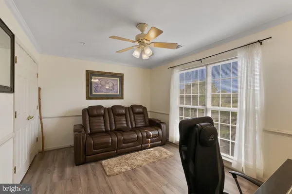 a view of storage and utility room with washer and dryer