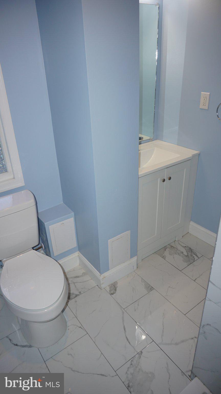 5854 Deale Churchton Road Deale, MD 20751 - Photo 24 of 57 Serene blue bathroom retreat.