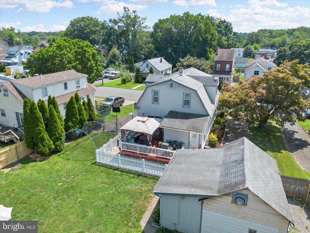 1727 6th Street Ewing, NJ 08638 - Photo 12 of 40 an aerial view of a house with a garden and lake view