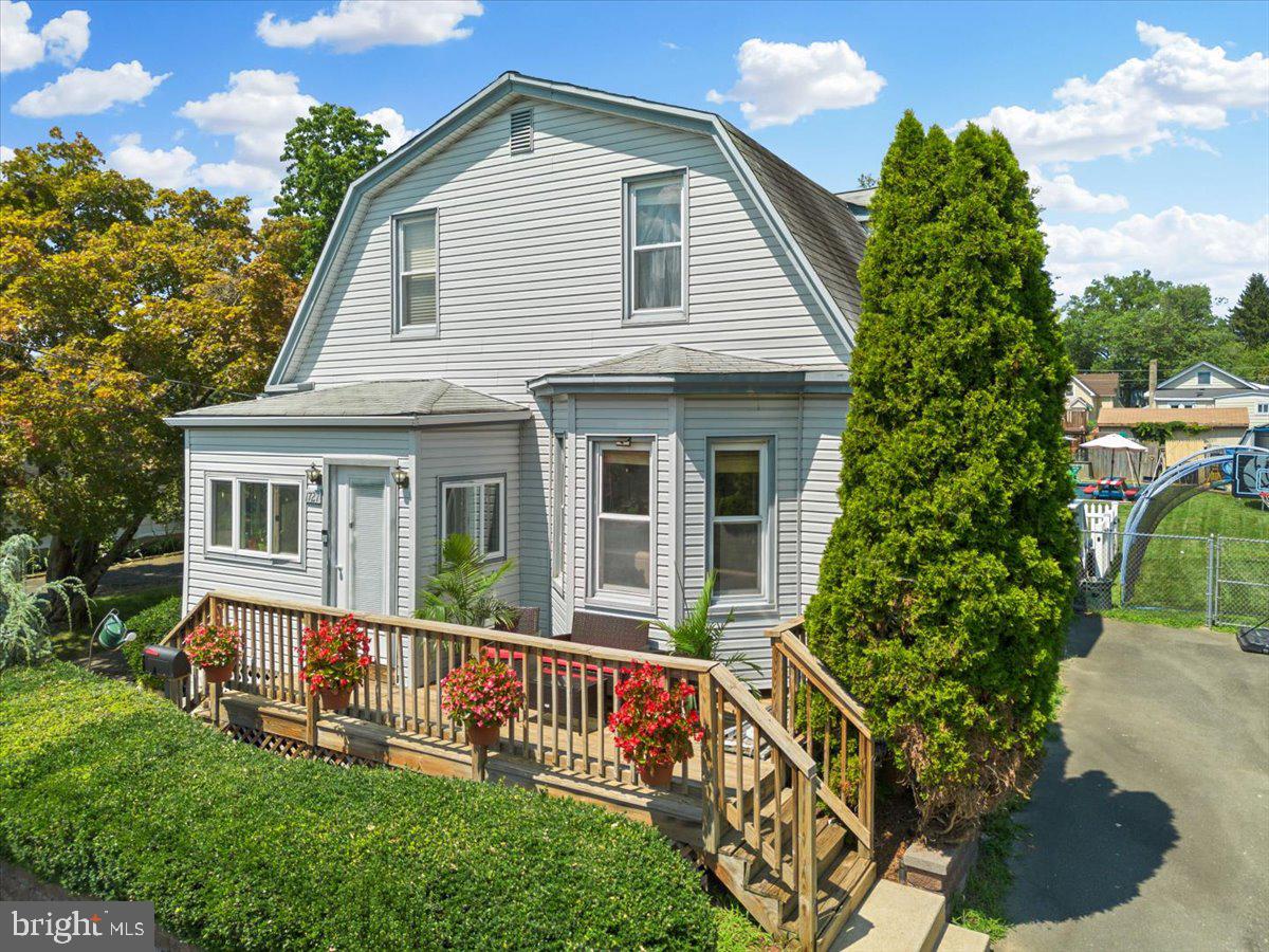 1727 6th Street Ewing, NJ 08638 - Photo 3 of 40 a view of a house with a yard