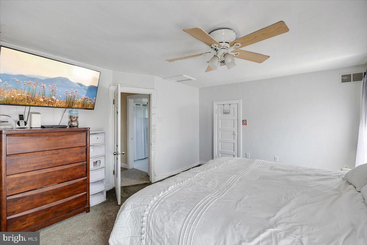 1727 6th Street Ewing, NJ 08638 - Photo 31 of 40 a bedroom with a bed and a window