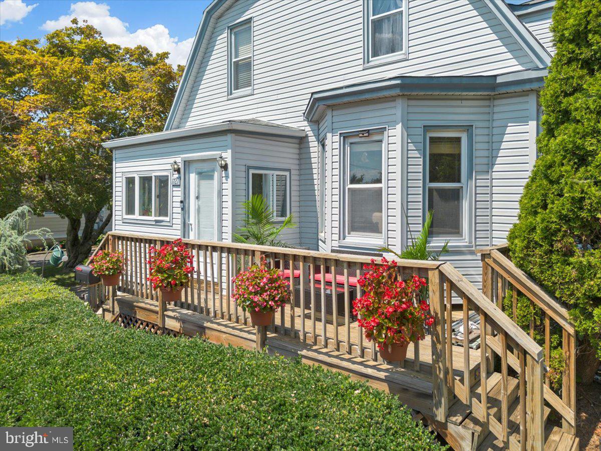 1727 6th Street Ewing, NJ 08638 - Photo 5 of 40 a view of a house with wooden fence