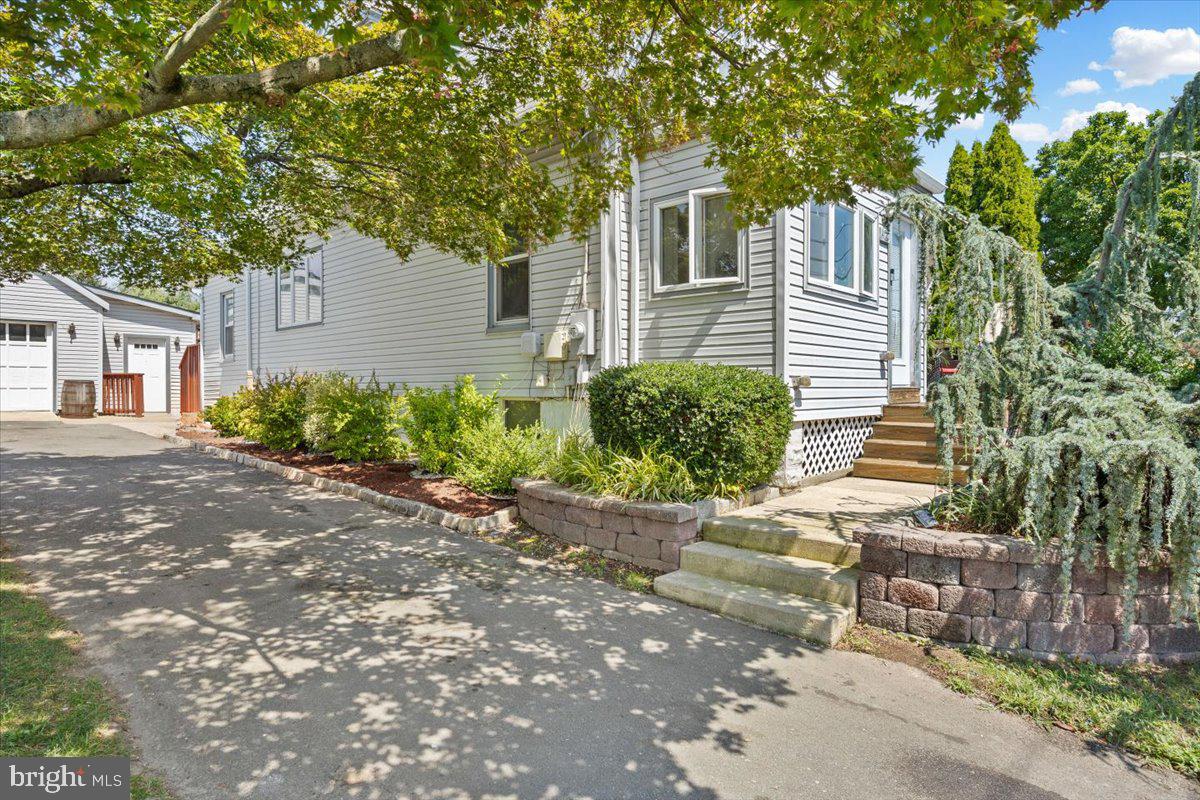 1727 6th Street Ewing, NJ 08638 - Photo 6 of 40 a view of a house with a yard