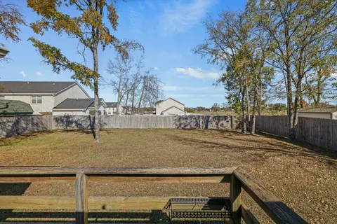 a view of street with large trees