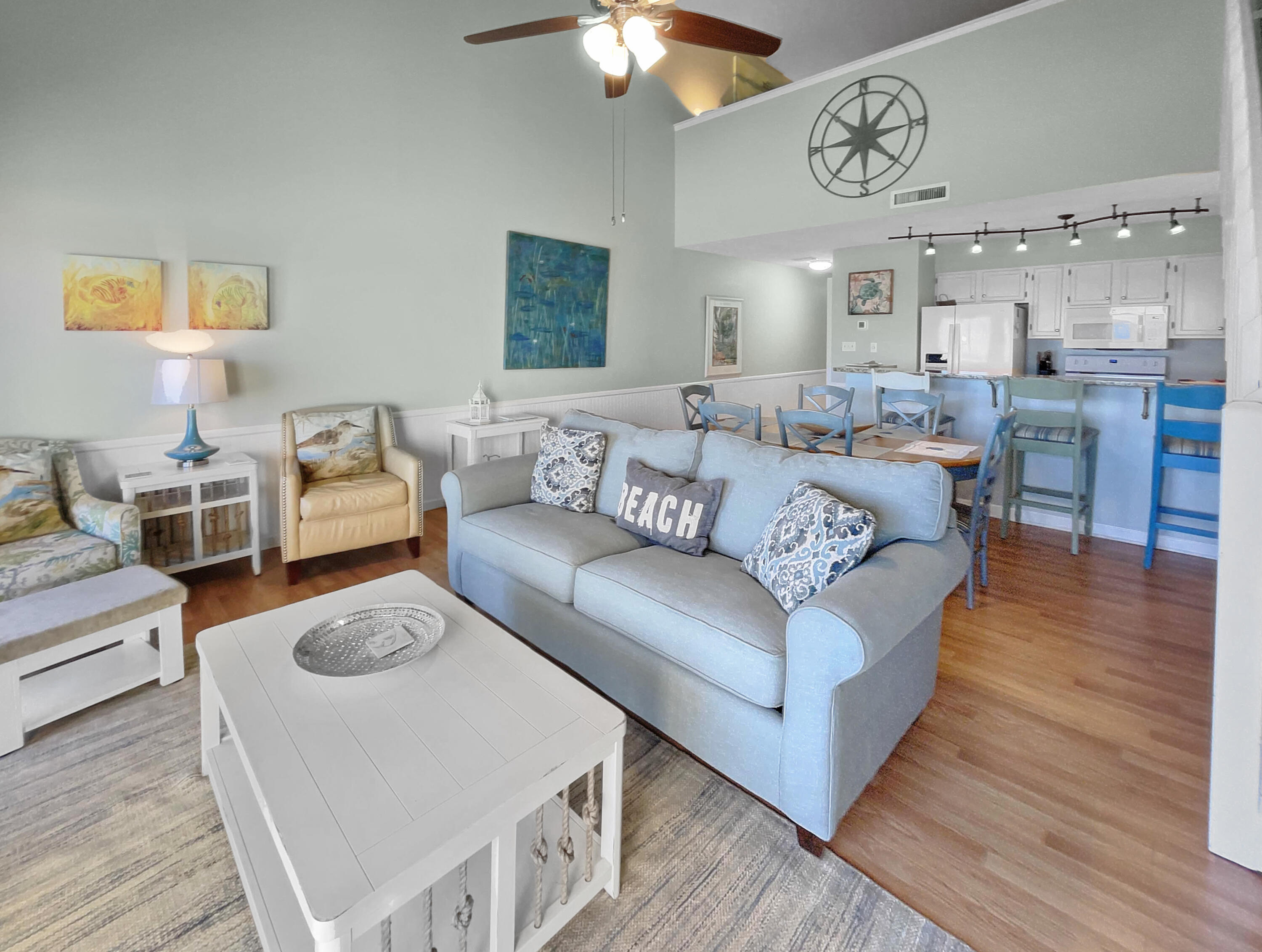 595 Eastern Lake Road, Unit 213 Santa Rosa Beach, FL 32459 - Photo 5 of 18 a living room with furniture and a wooden floor