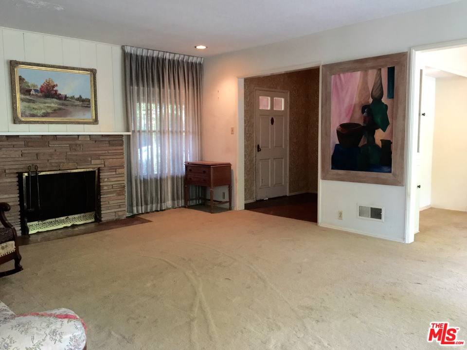 1065 Old Mill Road Pasadena, CA 91108 - Photo 3 of 7 a view of a livingroom with a fireplace