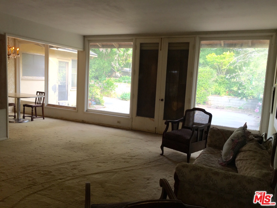 1065 Old Mill Road Pasadena, CA 91108 - Photo 5 of 7 a living room with furniture and a large window
