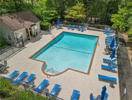an aerial view of a house with outdoor space