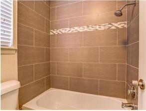 6403 Auburn Drive, Unit B Austin, TX 78723 - Photo 11 of 18 a bathroom with a shower