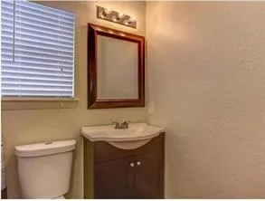 a bathroom with a sink and a toilet