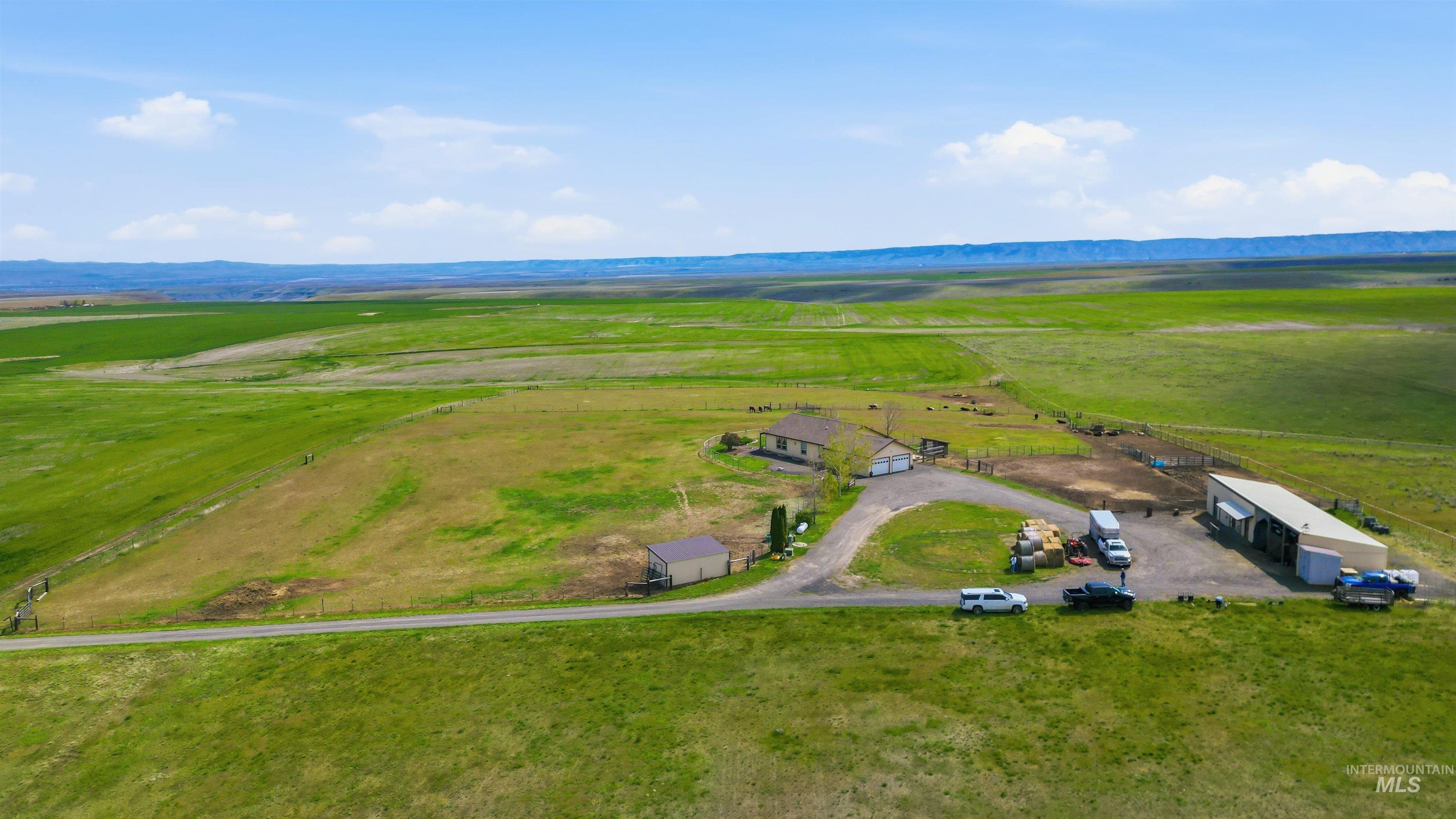 19397 Cloverland Road Asotin, WA 99402 - Photo 23 of 37 Expansive rural property featuring a main residence, detached garage, and a large metal outbuilding
