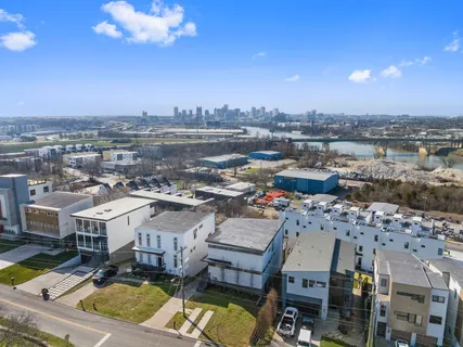 a view of a city with yard