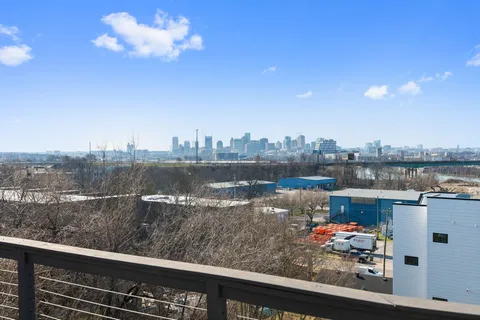 a view of a lake from a balcony