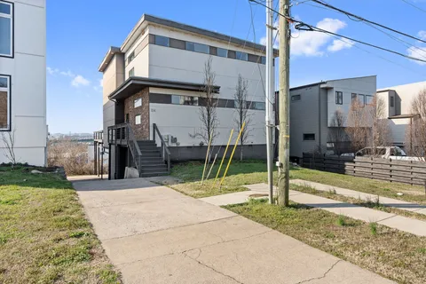 a street view along with residential houses