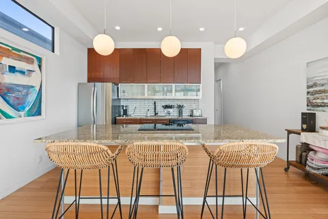 a kitchen with a table and chairs in it