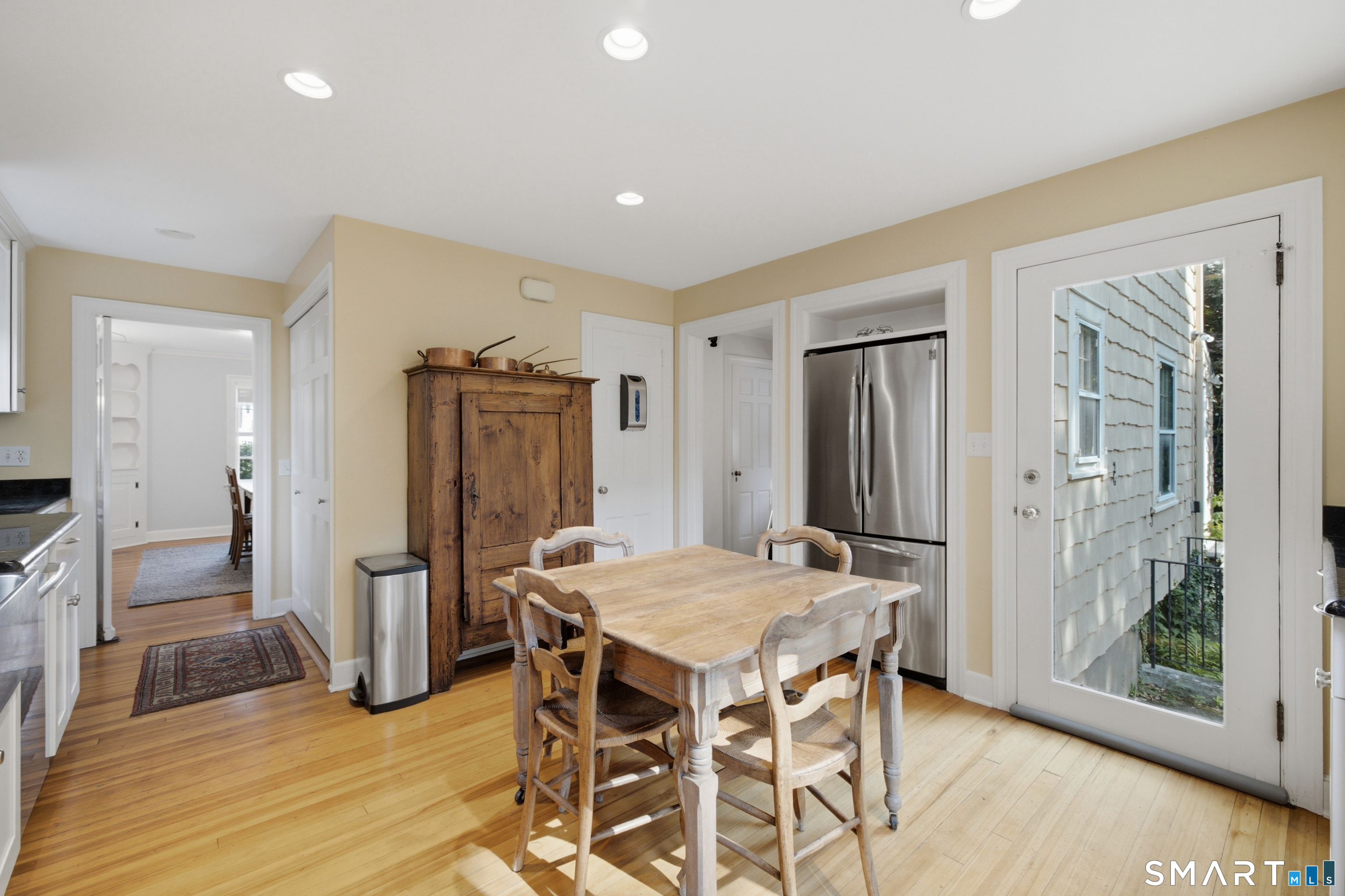 9 Stratford Road West Hartford, CT 06117 - Photo 12 of 40 The kitchen has a sunny eat-in area with a door leading to the patio