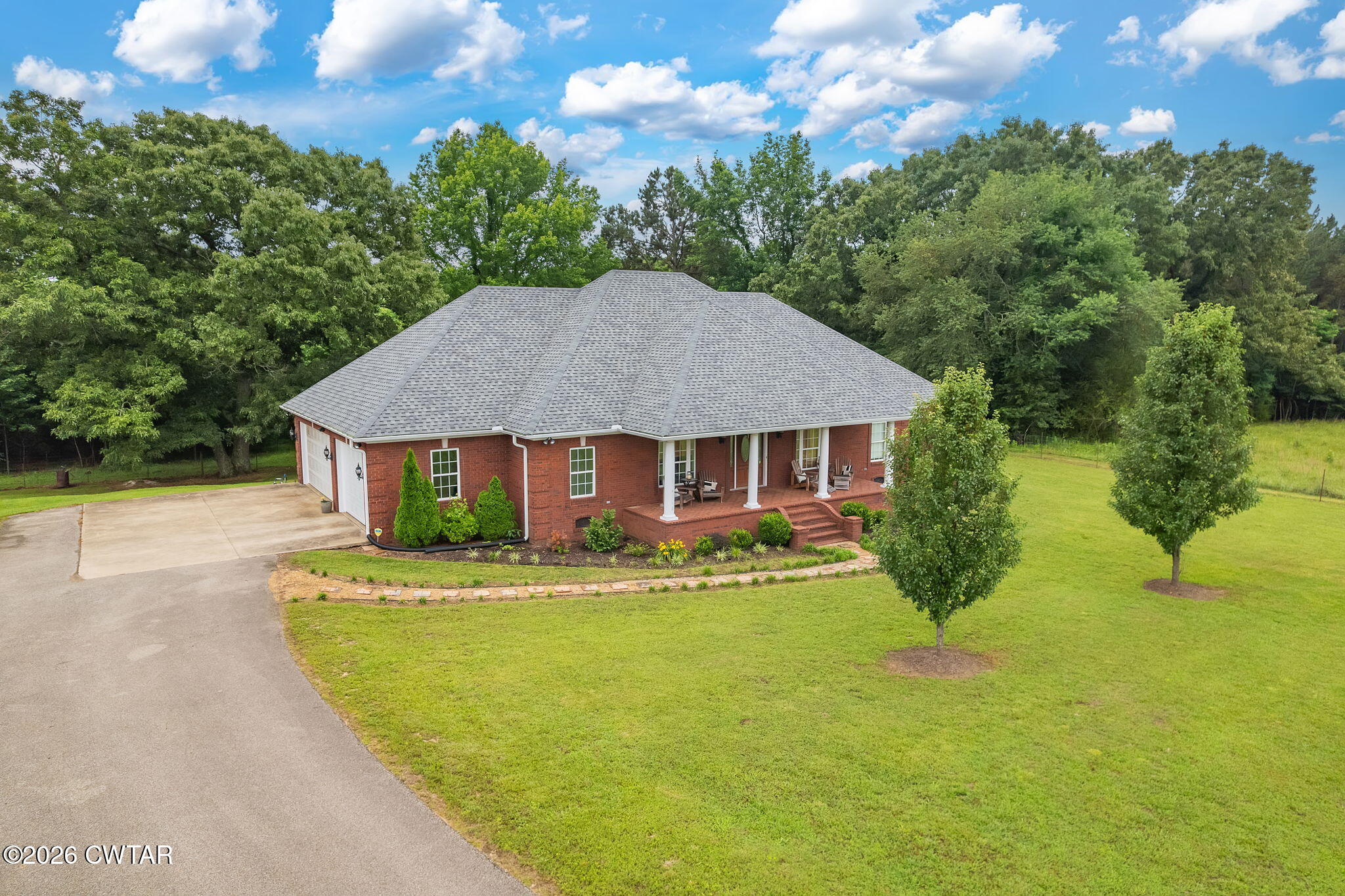 4320 Timberlake-Wildersville Road Lexington, TN 38351 - Photo 56 of 58 a front view of house with yard and green space