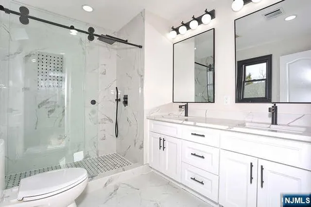 $975,000 | 21 East Clinton Avenue, Bergenfield, NJ 07621