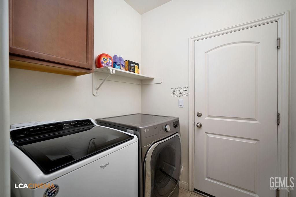 Undisclosed Address Bakersfield, CA 93314 - Photo 13 of 22 a utility room with dryer and washer