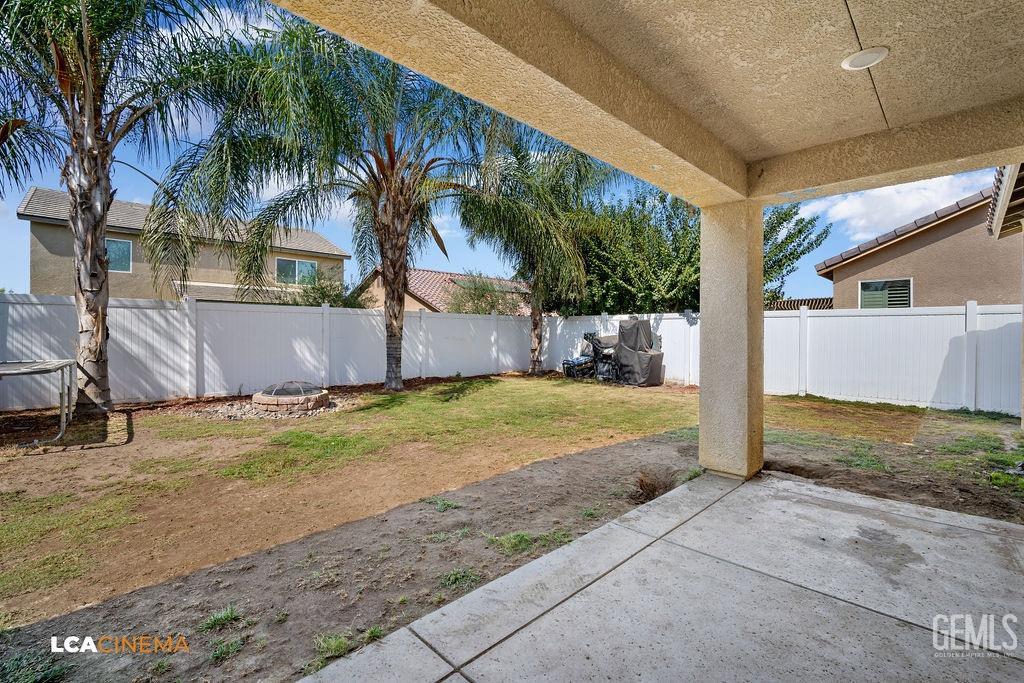 Undisclosed Address Bakersfield, CA 93314 - Photo 18 of 22 a view of a house with a yard