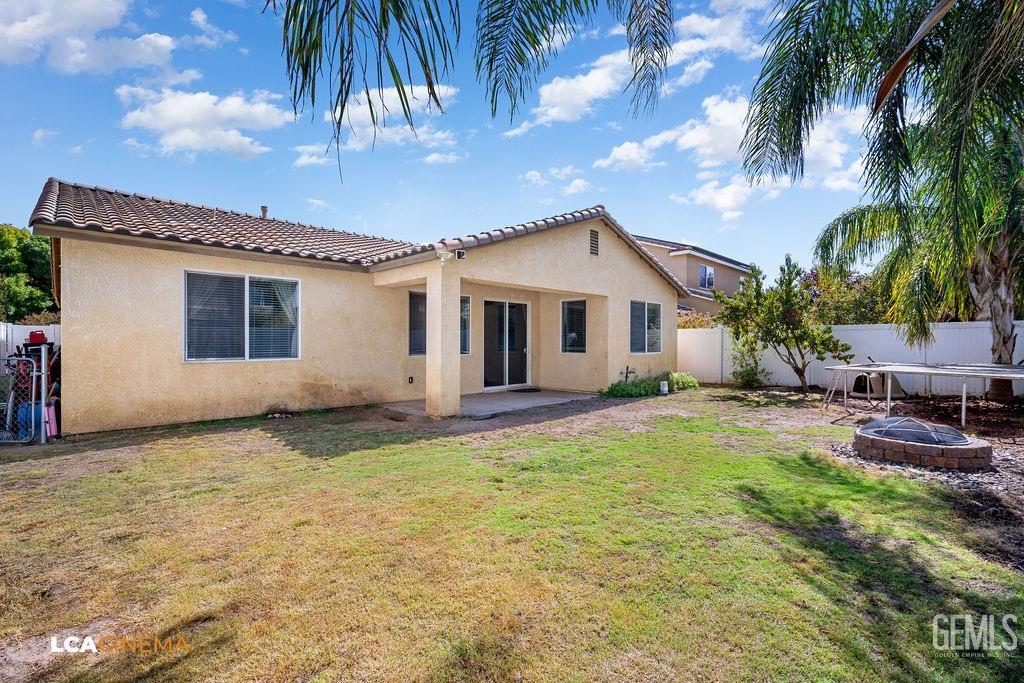Undisclosed Address Bakersfield, CA 93314 - Photo 19 of 22 a view of a house with swimming pool and sitting area