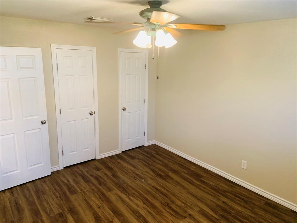 3302 Burke Road, Unit 9 Pasadena, TX 77504 - Photo 11 of 20 a view of small space with wooden floor