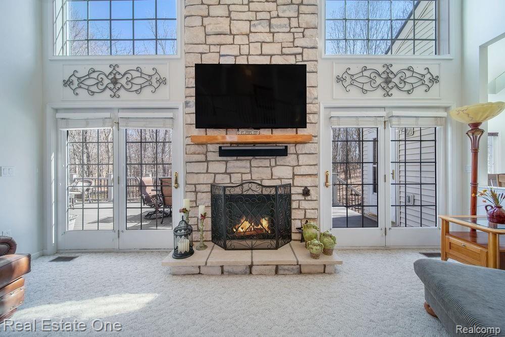 664 Timber Ridge Drive Highland, MI 48357 - Photo 5 of 50 Great Room with beautiful Fireplace