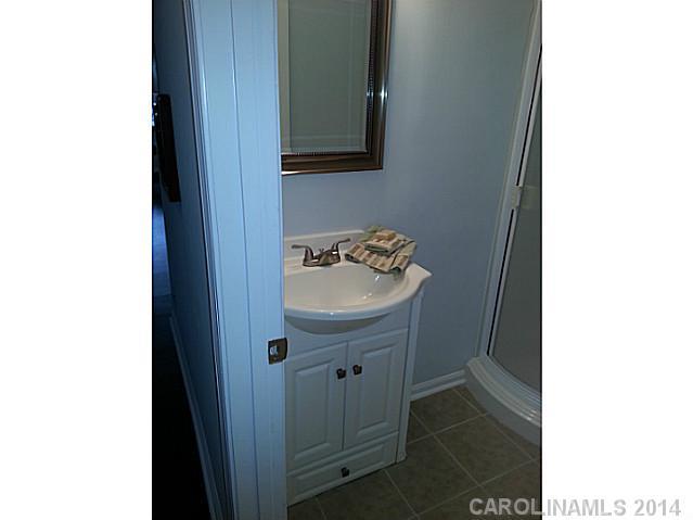 4605 Griffith Road Monroe, NC 28112 - Photo 12 of 16 a bathroom with a sink toilet
