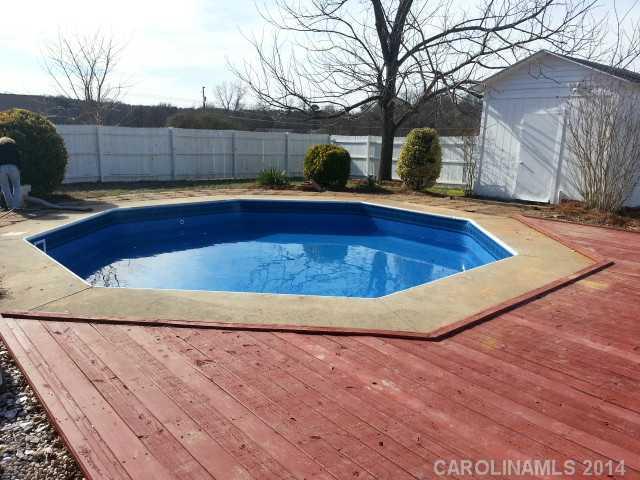 4605 Griffith Road Monroe, NC 28112 - Photo 15 of 16 a view of outdoor space with swimming pool and patio