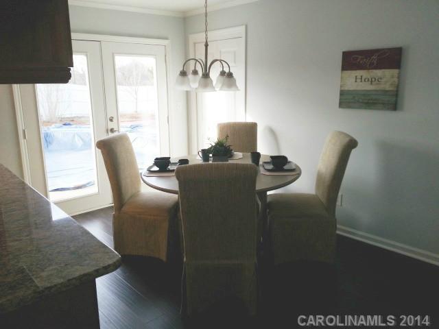 4605 Griffith Road Monroe, NC 28112 - Photo 7 of 16 a dining room with furniture and a window