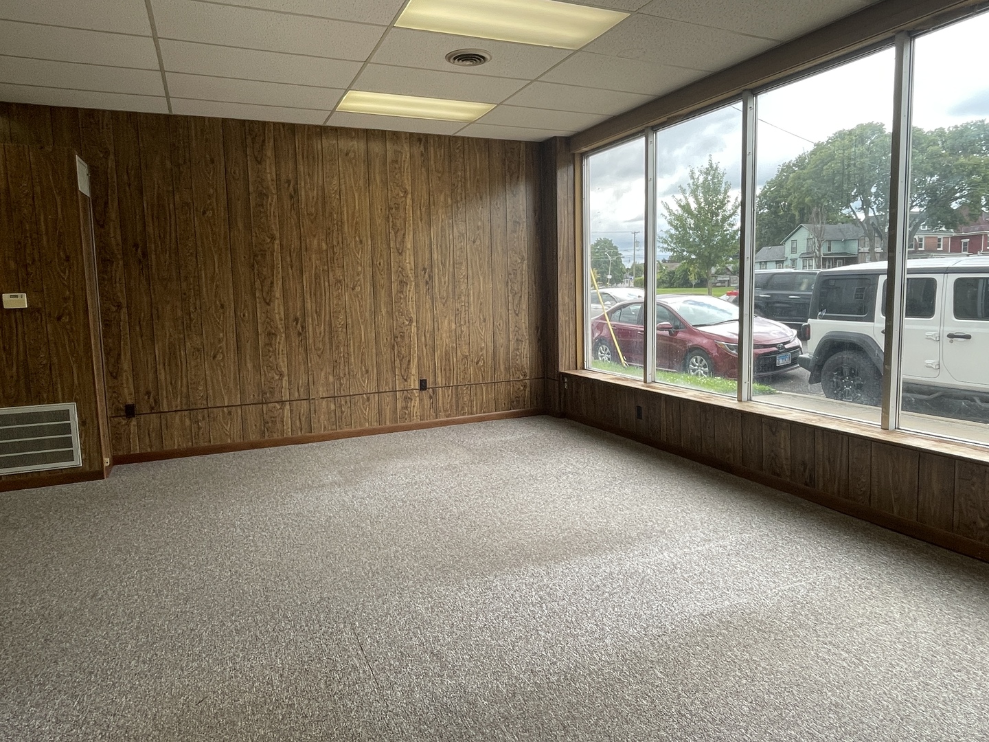 503 East 3rd Street Sterling, IL 61081 - Photo 6 of 10 a view of an empty room with a window