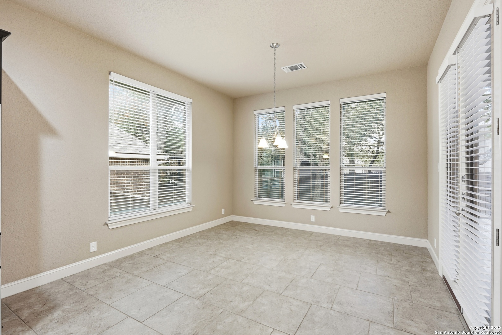 8234 Two Winds San Antonio, TX 78255 - Photo 15 of 37 a view of an empty room with a window