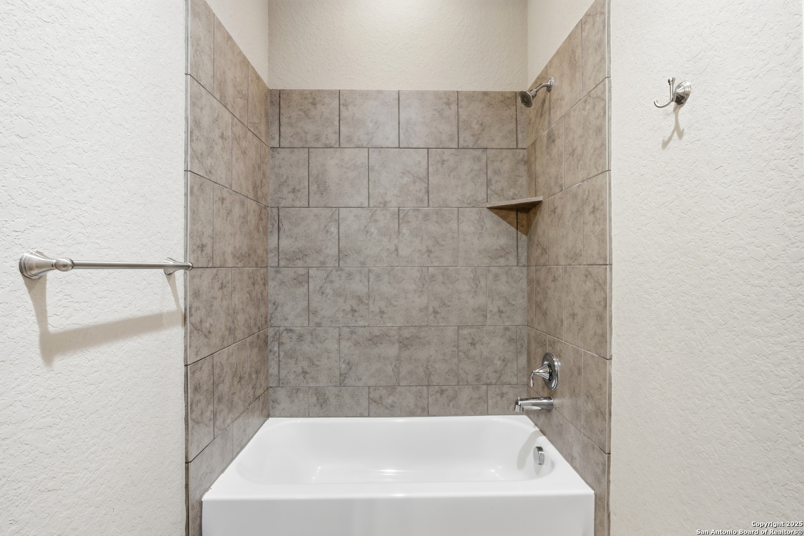 8234 Two Winds San Antonio, TX 78255 - Photo 24 of 37 a bathroom with a bathtub