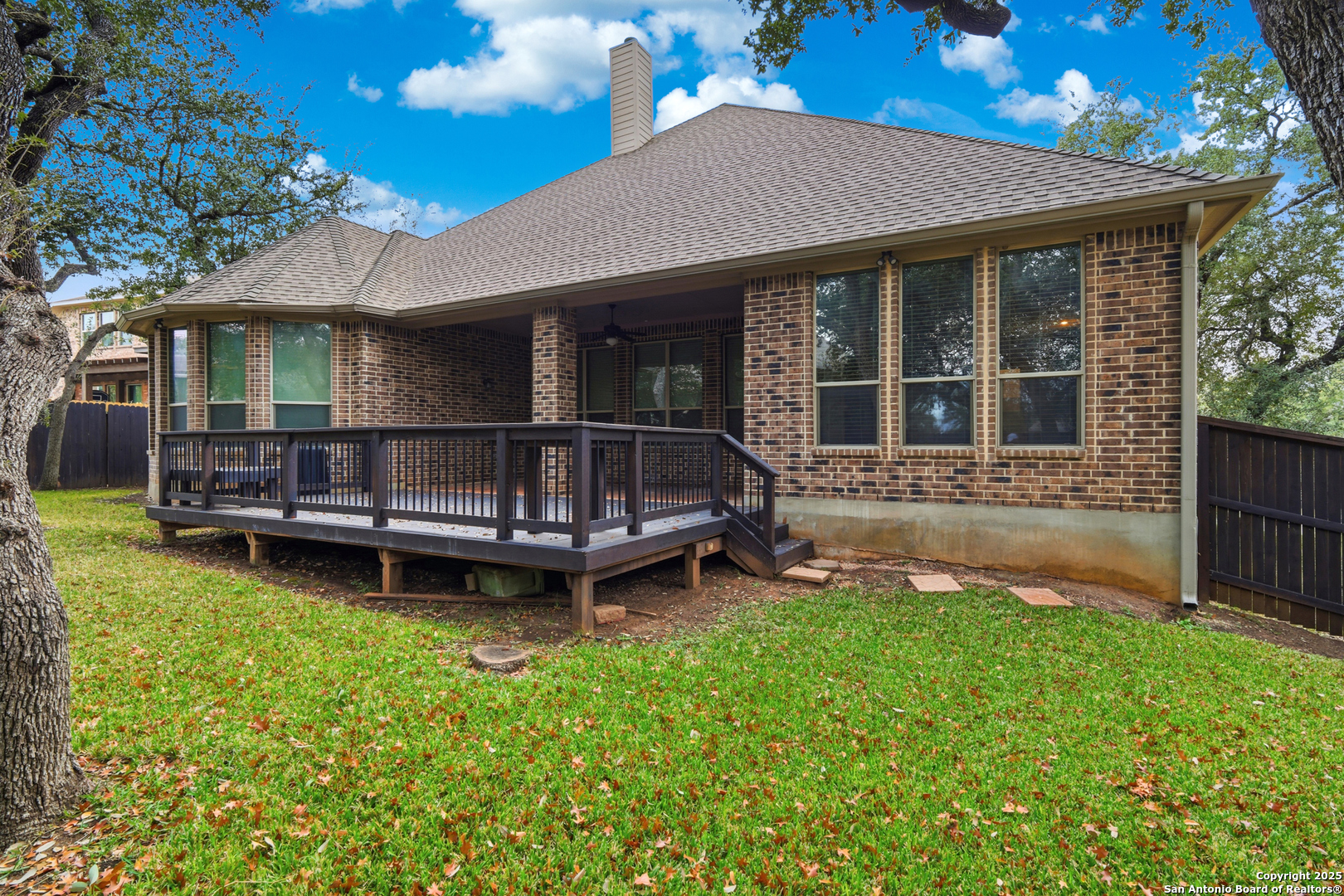 8234 Two Winds San Antonio, TX 78255 - Photo 28 of 37 a view of a house with a yard and sitting area