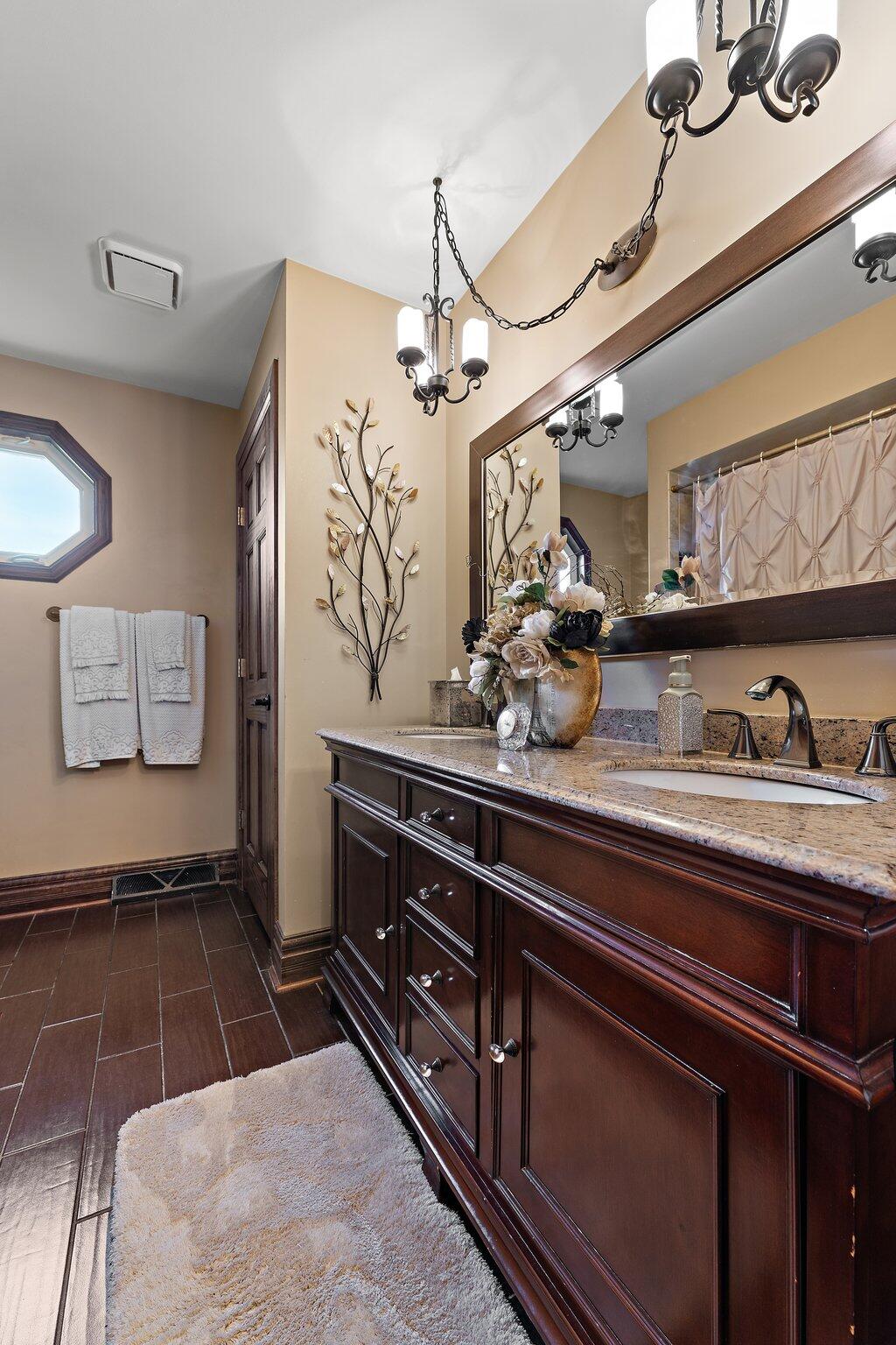 6881 West 86th Court Crown Point, IN 46307 - Photo 16 of 28 a kitchen with a sink and cabinets