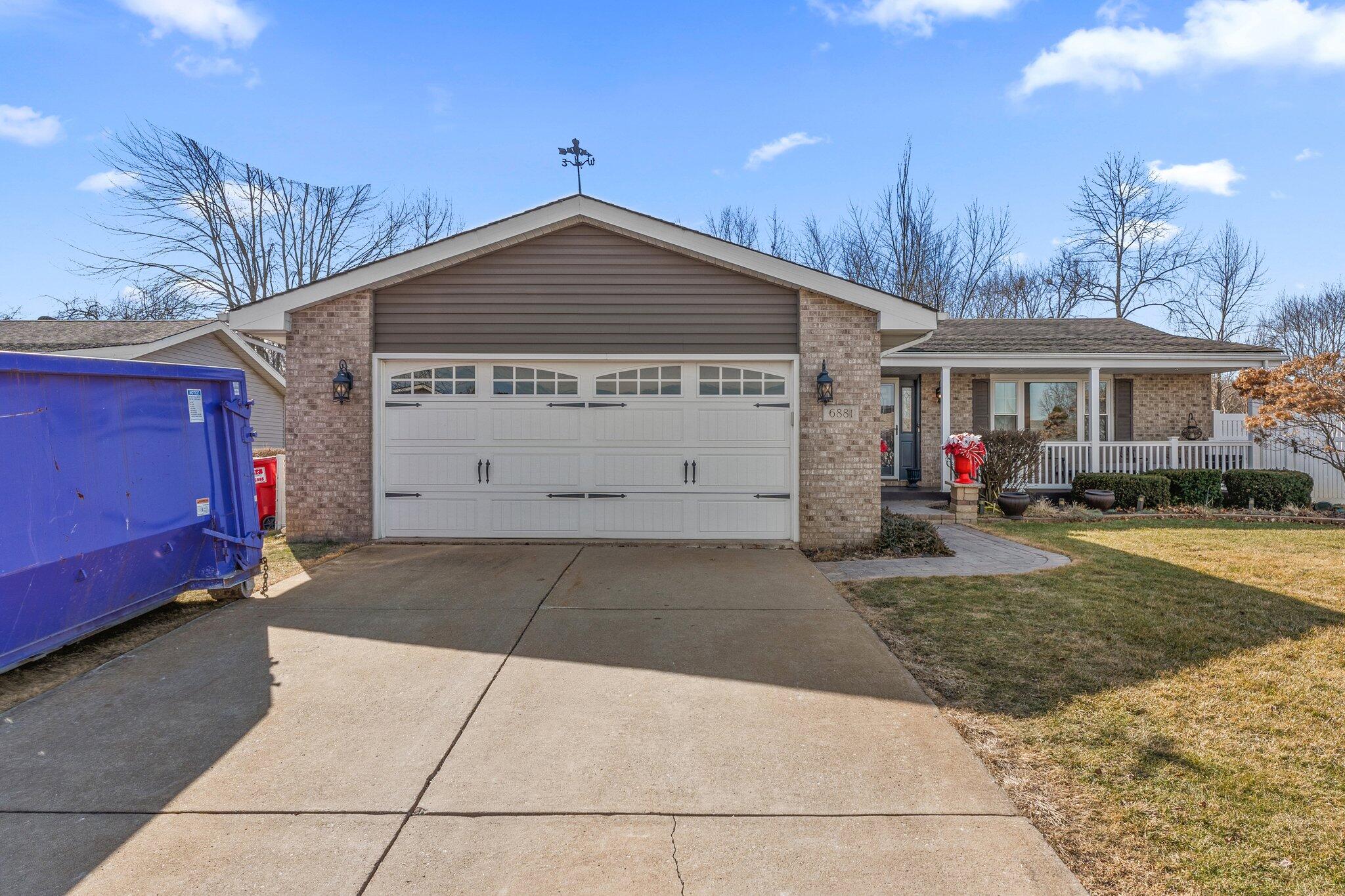 6881 West 86th Court Crown Point, IN 46307 - Photo 2 of 28 a view of a house with a yard