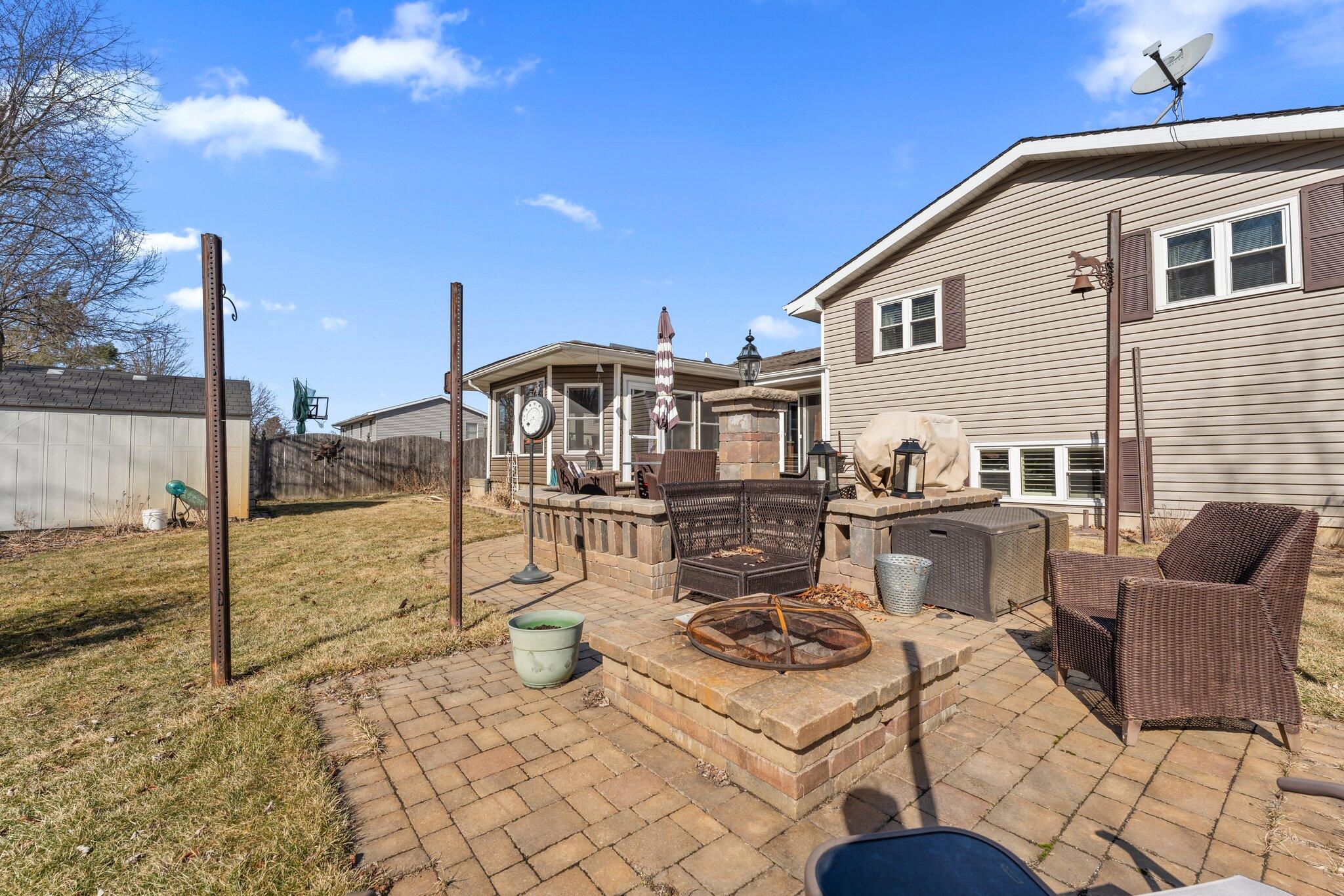 6881 West 86th Court Crown Point, IN 46307 - Photo 27 of 28 a view of a patio with swimming pool