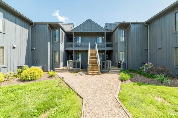 a front view of a house having yard
