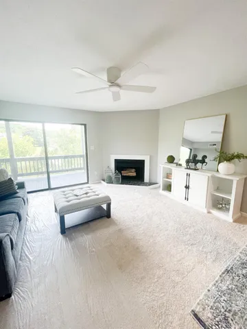 a view of fireplace and wooden floor