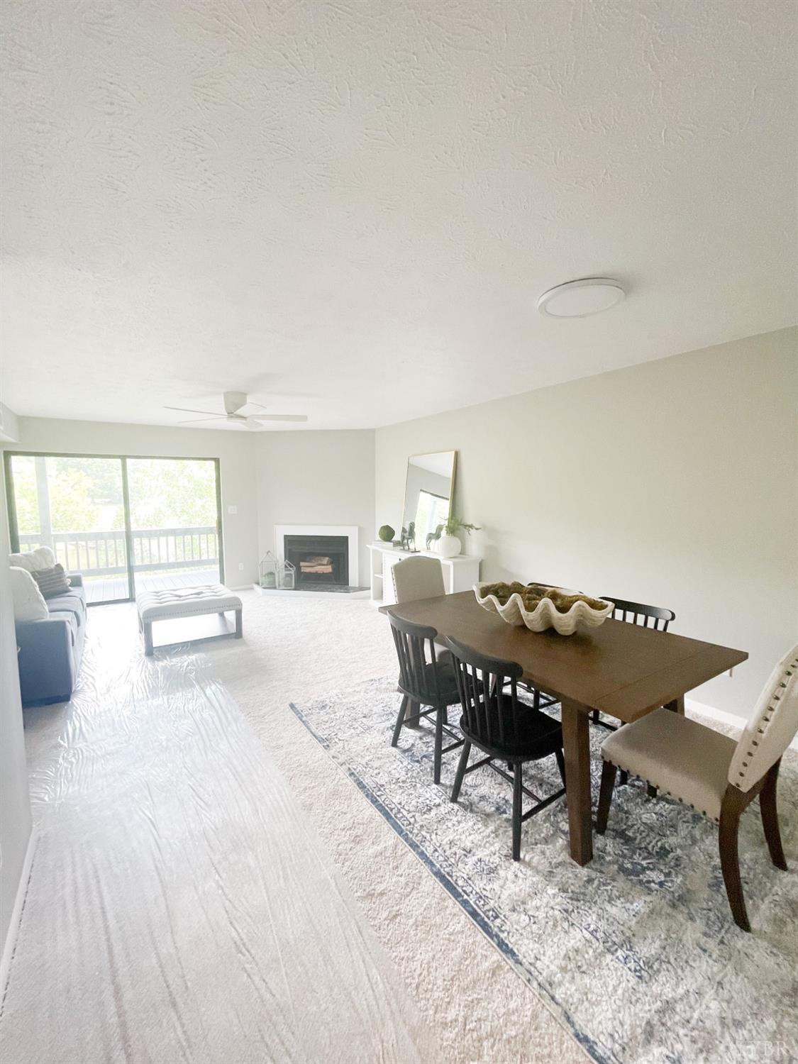 2222 Deer Run Forest, VA 24551 - Photo 18 of 44 a living room with a couch and a table