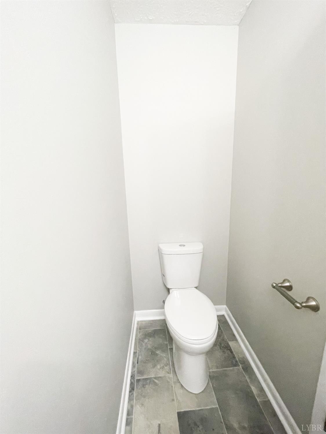 2222 Deer Run Forest, VA 24551 - Photo 31 of 44 a white toilet sitting next to a white wall