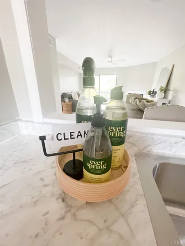 a kitchen with stainless steel appliances a stove sink and cabinets