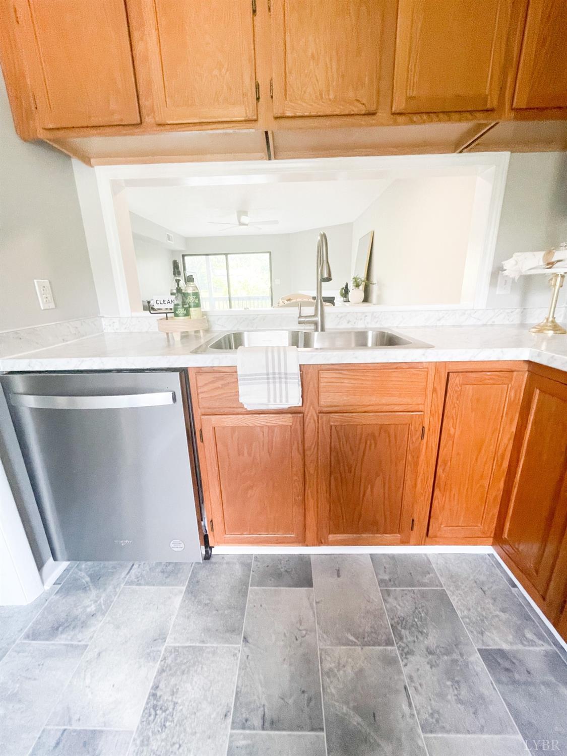 2222 Deer Run Forest, VA 24551 - Photo 10 of 44 a kitchen with granite countertop a sink and a stove
