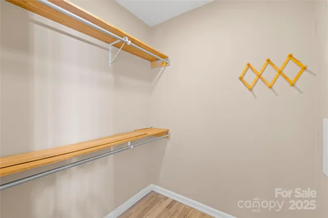 a view of small space with racks on the wall