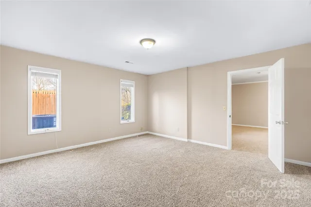 a view of an empty room with window