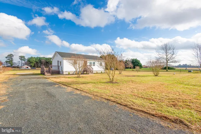 a view of a swimming pool and an outdoor space